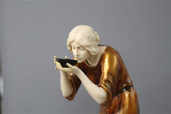 An Art Deco style resin figure of a lady, height 28cm